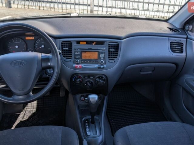 Черный Киа Рио, объемом двигателя 1.4 л и пробегом 287 тыс. км за 4400 $, фото 1 на Automoto.ua