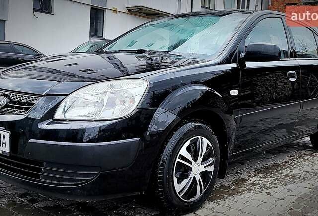 Черный Киа Рио, объемом двигателя 1.4 л и пробегом 218 тыс. км за 4600 $, фото 1 на Automoto.ua