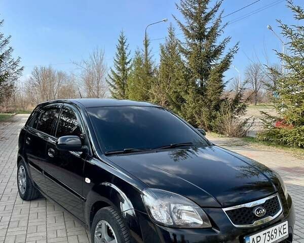 Черный Киа Рио, объемом двигателя 1.4 л и пробегом 127 тыс. км за 4600 $, фото 1 на Automoto.ua