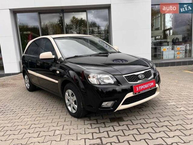 Чорний Кіа Ріо, об'ємом двигуна 1.5 л та пробігом 265 тис. км за 4700 $, фото 1 на Automoto.ua