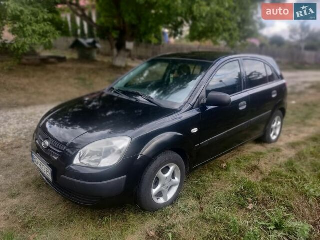 Черный Киа Рио, объемом двигателя 1.4 л и пробегом 260 тыс. км за 3450 $, фото 1 на Automoto.ua