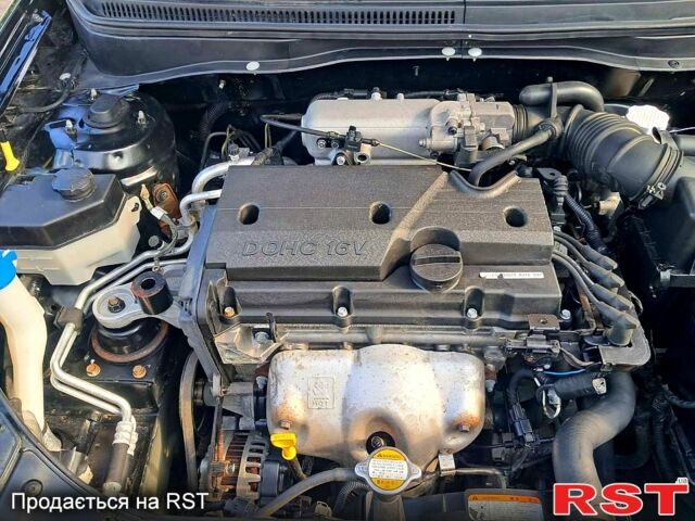 Черный Киа Рио, объемом двигателя 1.4 л и пробегом 107 тыс. км за 5000 $, фото 1 на Automoto.ua