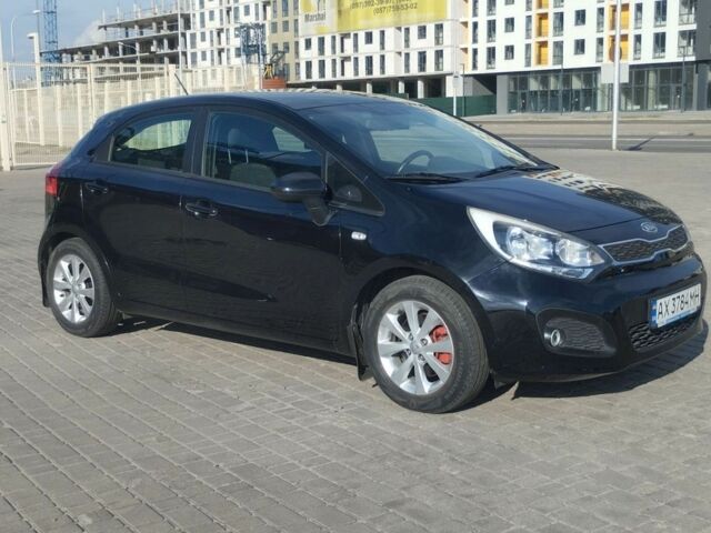 Чорний Кіа Ріо, об'ємом двигуна 1.25 л та пробігом 210 тис. км за 6500 $, фото 1 на Automoto.ua