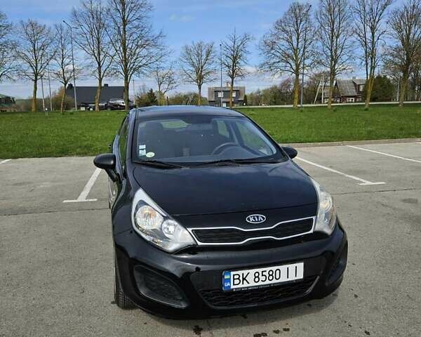 Чорний Кіа Ріо, об'ємом двигуна 1.1 л та пробігом 143 тис. км за 6830 $, фото 1 на Automoto.ua