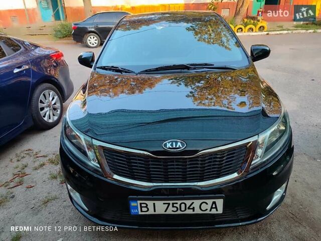 Чорний Кіа Ріо, об'ємом двигуна 1.4 л та пробігом 41 тис. км за 8500 $, фото 1 на Automoto.ua