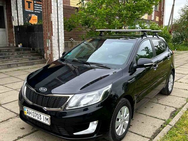 Черный Киа Рио, объемом двигателя 1.6 л и пробегом 160 тыс. км за 8200 $, фото 1 на Automoto.ua