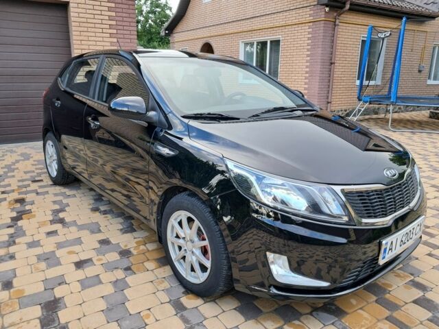Черный Киа Рио, объемом двигателя 1 л и пробегом 172 тыс. км за 5516 $, фото 1 на Automoto.ua