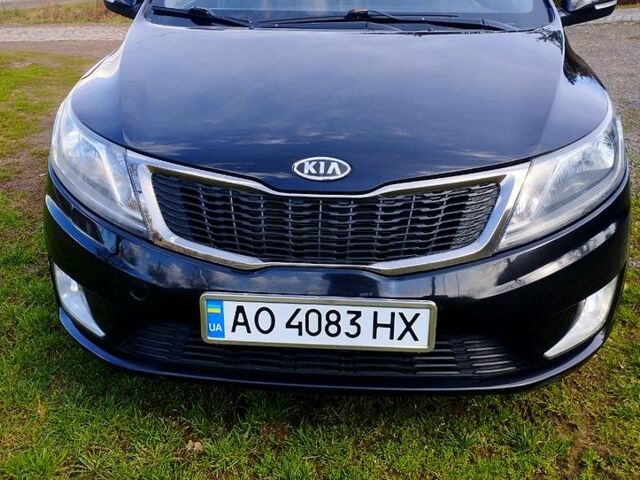 Черный Киа Рио, объемом двигателя 1.6 л и пробегом 199 тыс. км за 7000 $, фото 1 на Automoto.ua