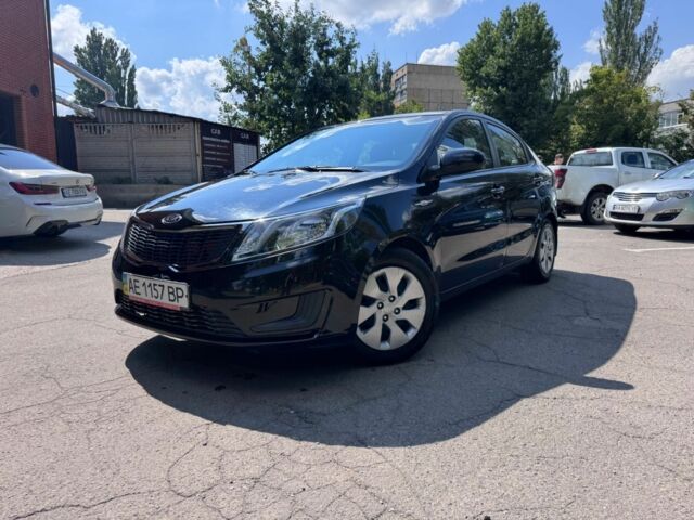 Чорний Кіа Ріо, об'ємом двигуна 1.4 л та пробігом 53 тис. км за 8507 $, фото 1 на Automoto.ua