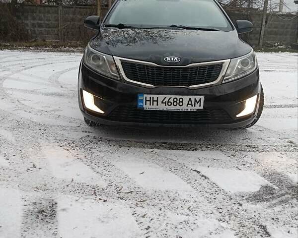 Чорний Кіа Ріо, об'ємом двигуна 1.6 л та пробігом 157 тис. км за 8300 $, фото 1 на Automoto.ua