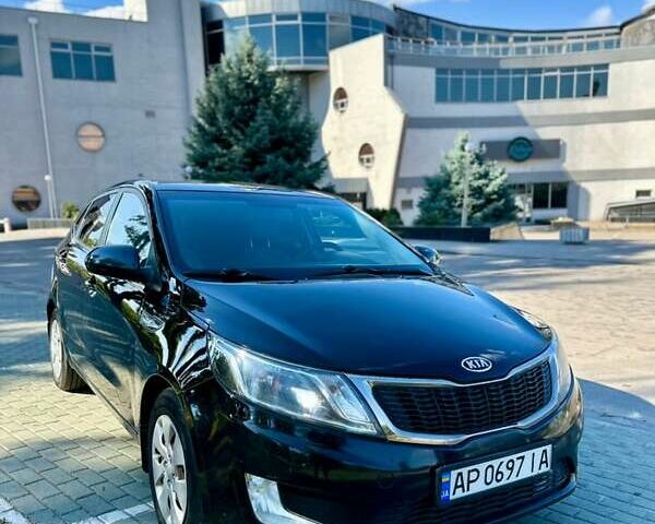Чорний Кіа Ріо, об'ємом двигуна 1.59 л та пробігом 156 тис. км за 6700 $, фото 1 на Automoto.ua