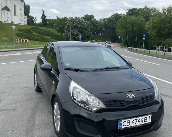 Чорний Кіа Ріо, об'ємом двигуна 1.2 л та пробігом 200 тис. км за 5700 $, фото 1 на Automoto.ua