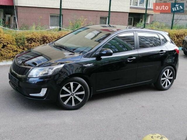 Черный Киа Рио, объемом двигателя 1.6 л и пробегом 156 тыс. км за 7950 $, фото 1 на Automoto.ua
