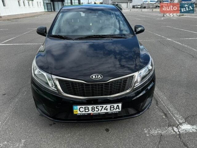 Черный Киа Рио, объемом двигателя 1.4 л и пробегом 125 тыс. км за 6000 $, фото 1 на Automoto.ua