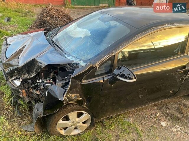 Черный Киа Рио, объемом двигателя 1.12 л и пробегом 177 тыс. км за 2200 $, фото 1 на Automoto.ua