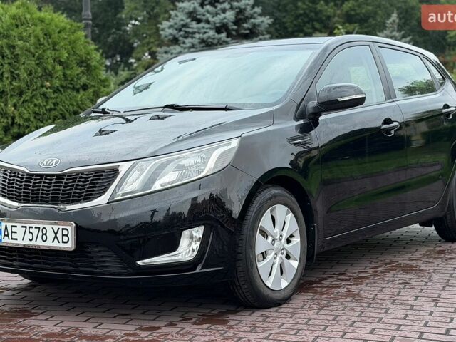 Черный Киа Рио, объемом двигателя 1.6 л и пробегом 94 тыс. км за 7300 $, фото 1 на Automoto.ua