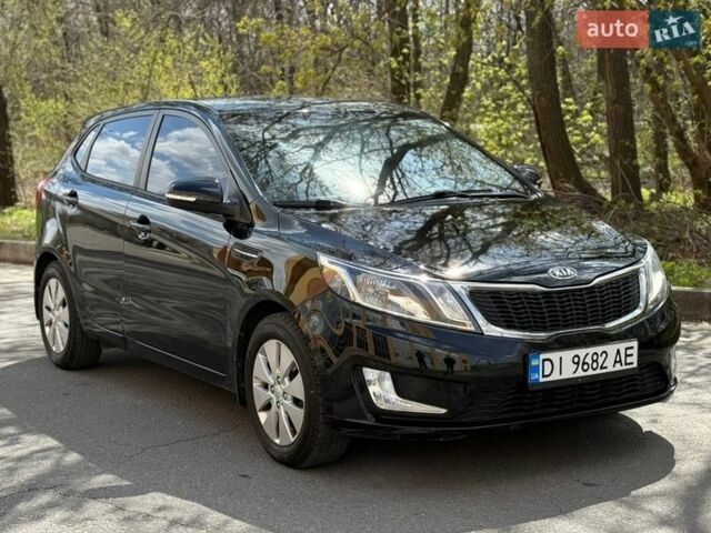Черный Киа Рио, объемом двигателя 1.59 л и пробегом 203 тыс. км за 6199 $, фото 1 на Automoto.ua