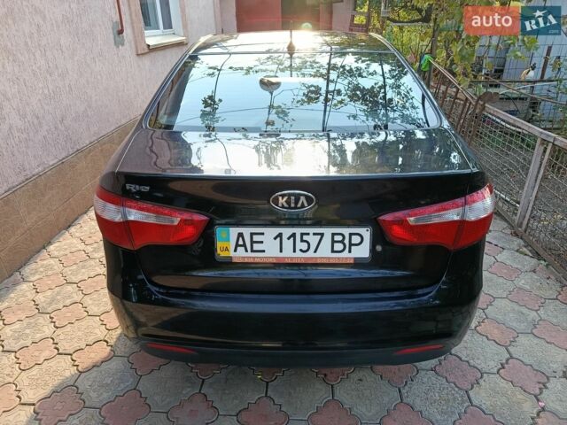 Черный Киа Рио, объемом двигателя 1.4 л и пробегом 53 тыс. км за 8400 $, фото 1 на Automoto.ua
