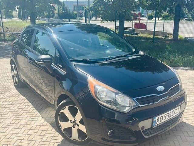Чорний Кіа Ріо, об'ємом двигуна 1.59 л та пробігом 125 тис. км за 6500 $, фото 1 на Automoto.ua