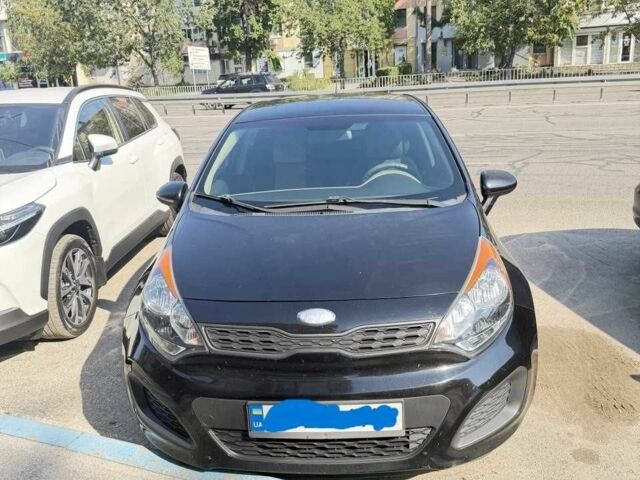 Чорний Кіа Ріо, об'ємом двигуна 1.6 л та пробігом 133 тис. км за 6023 $, фото 1 на Automoto.ua