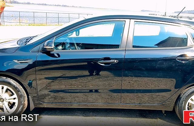 Черный Киа Рио, объемом двигателя 1.6 л и пробегом 62 тыс. км за 9350 $, фото 1 на Automoto.ua