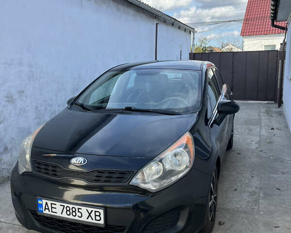 Черный Киа Рио, объемом двигателя 1.6 л и пробегом 280 тыс. км за 7700 $, фото 1 на Automoto.ua