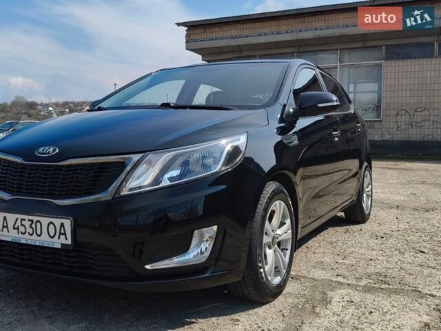 Чорний Кіа Ріо, об'ємом двигуна 1.59 л та пробігом 62 тис. км за 9300 $, фото 1 на Automoto.ua