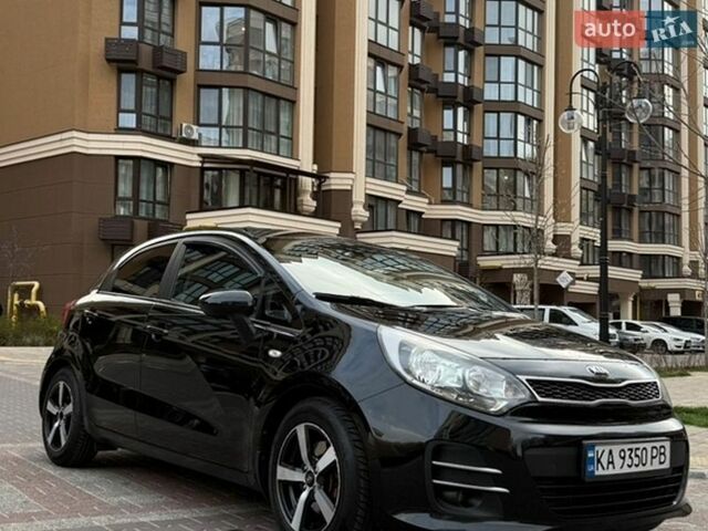 Черный Киа Рио, объемом двигателя 1.4 л и пробегом 74 тыс. км за 12900 $, фото 1 на Automoto.ua