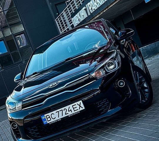 Черный Киа Рио, объемом двигателя 1.37 л и пробегом 67 тыс. км за 15200 $, фото 1 на Automoto.ua