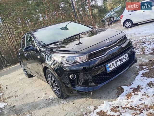 Черный Киа Рио, объемом двигателя 1.4 л и пробегом 63 тыс. км за 13150 $, фото 1 на Automoto.ua