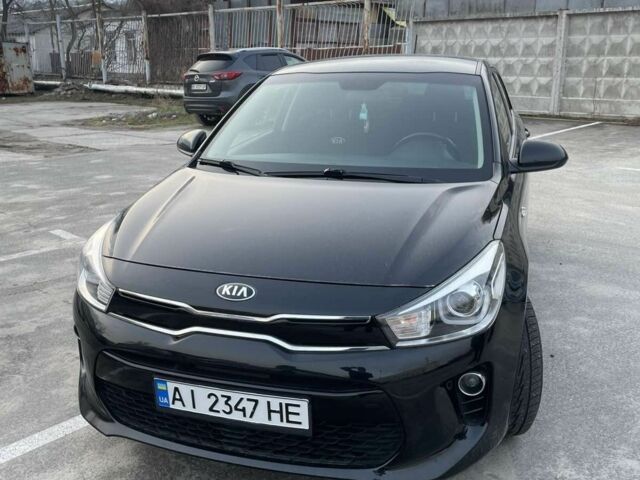Черный Киа Рио, объемом двигателя 1.4 л и пробегом 51 тыс. км за 13000 $, фото 1 на Automoto.ua