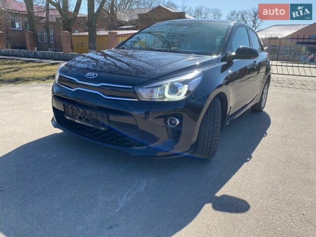 Чорний Кіа Ріо, об'ємом двигуна 1.4 л та пробігом 89 тис. км за 12700 $, фото 1 на Automoto.ua