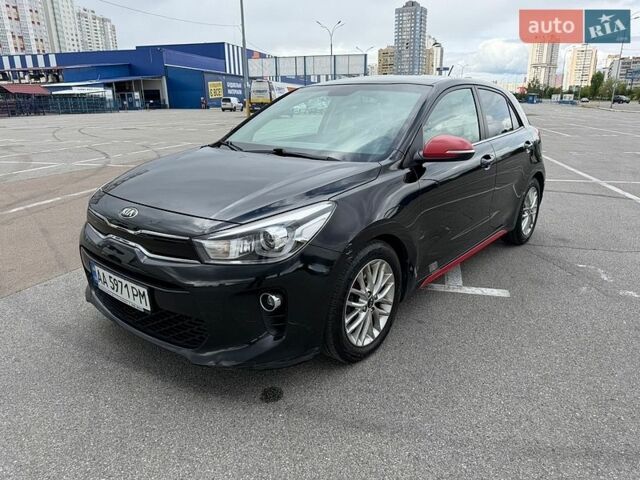 Черный Киа Рио, объемом двигателя 1.37 л и пробегом 90 тыс. км за 12000 $, фото 1 на Automoto.ua