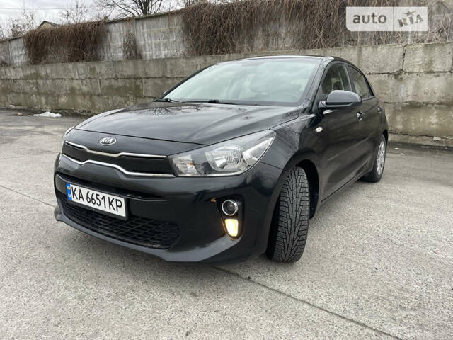 Черный Киа Рио, объемом двигателя 1.25 л и пробегом 86 тыс. км за 9952 $, фото 1 на Automoto.ua