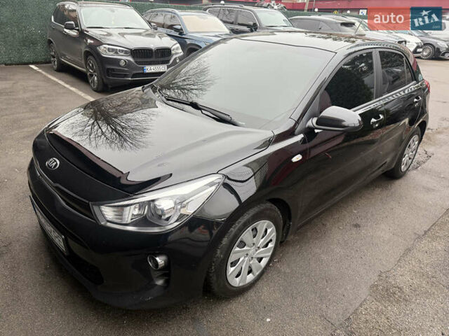 Чорний Кіа Ріо, об'ємом двигуна 1.37 л та пробігом 99 тис. км за 14500 $, фото 1 на Automoto.ua