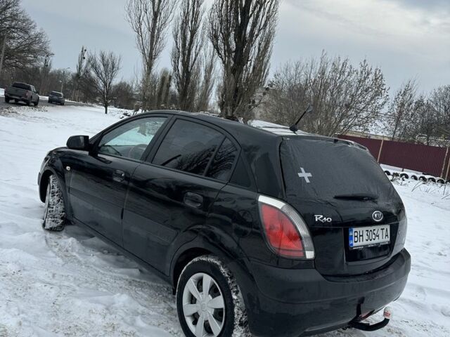 Черный Киа Рио, объемом двигателя 1.4 л и пробегом 178 тыс. км за 2100 $, фото 1 на Automoto.ua