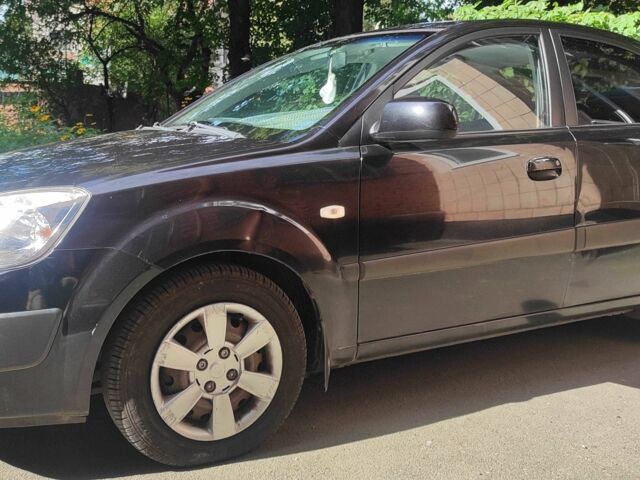 Черный Киа Рио, объемом двигателя 1.4 л и пробегом 196 тыс. км за 3300 $, фото 1 на Automoto.ua