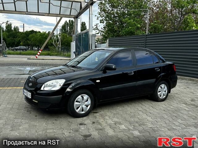 Черный Киа Рио, объемом двигателя 1.4 л и пробегом 250 тыс. км за 4999 $, фото 1 на Automoto.ua