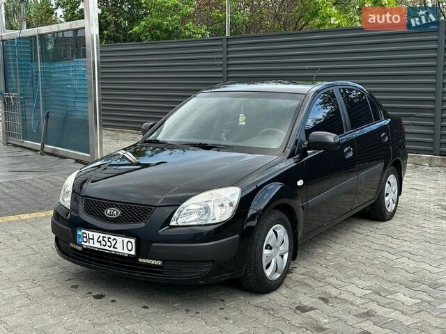 Чорний Кіа Ріо, об'ємом двигуна 1.4 л та пробігом 252 тис. км за 4999 $, фото 1 на Automoto.ua