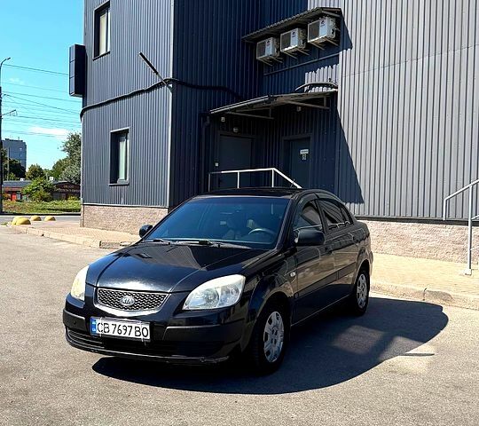 Чорний Кіа Ріо, об'ємом двигуна 1.4 л та пробігом 235 тис. км за 3200 $, фото 1 на Automoto.ua