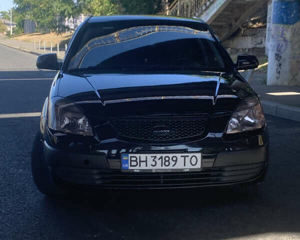 Чорний Кіа Ріо, об'ємом двигуна 1.5 л та пробігом 261 тис. км за 3700 $, фото 1 на Automoto.ua
