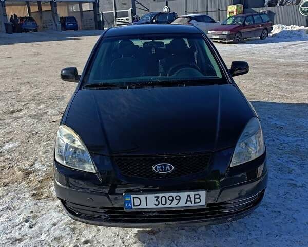 Черный Киа Рио, объемом двигателя 1.4 л и пробегом 259 тыс. км за 4500 $, фото 1 на Automoto.ua