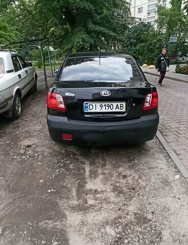 Чорний Кіа Ріо, об'ємом двигуна 1.4 л та пробігом 260 тис. км за 3800 $, фото 1 на Automoto.ua