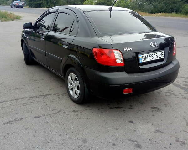 Черный Киа Рио, объемом двигателя 1.4 л и пробегом 85 тыс. км за 6000 $, фото 1 на Automoto.ua