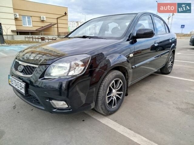 Черный Киа Рио, объемом двигателя 1.5 л и пробегом 155 тыс. км за 5650 $, фото 1 на Automoto.ua