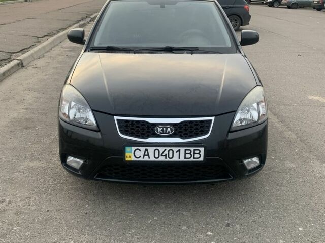 Чорний Кіа Ріо, об'ємом двигуна 1.4 л та пробігом 189 тис. км за 5463 $, фото 1 на Automoto.ua