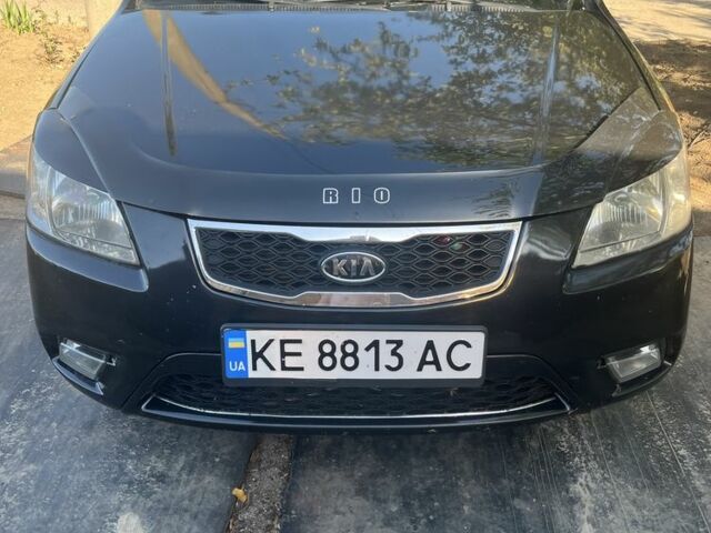 Черный Киа Рио, объемом двигателя 1.4 л и пробегом 282 тыс. км за 4700 $, фото 1 на Automoto.ua