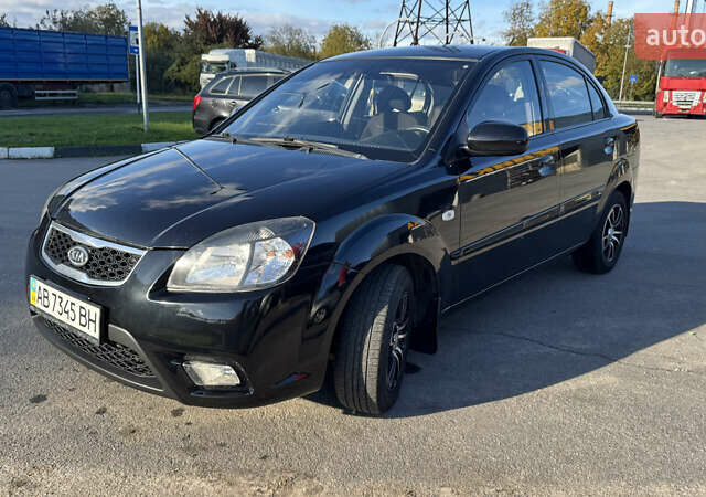Чорний Кіа Ріо, об'ємом двигуна 1.5 л та пробігом 154 тис. км за 6900 $, фото 1 на Automoto.ua
