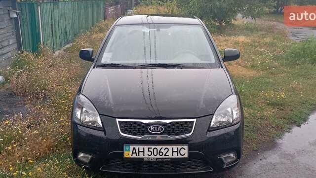 Черный Киа Рио, объемом двигателя 1.4 л и пробегом 32 тыс. км за 6800 $, фото 1 на Automoto.ua