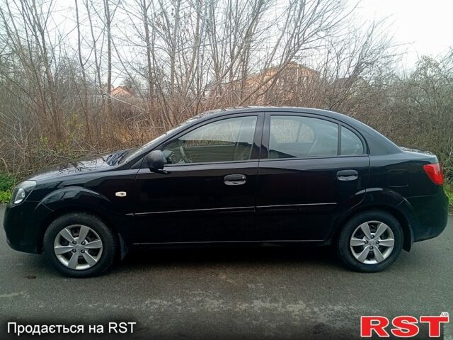 Чорний Кіа Ріо, об'ємом двигуна 1.4 л та пробігом 186 тис. км за 4800 $, фото 1 на Automoto.ua